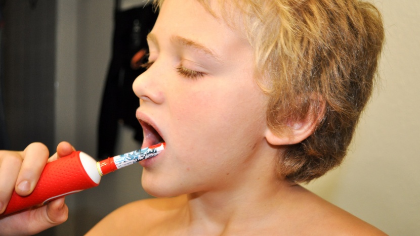 electric toothbrush kids - the oral-b has a round brush head that is super comfortable for kids...