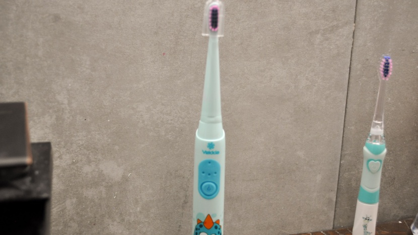 electric toothbrush kids - the vekkia is a cute dragon brush with multiple brush heads