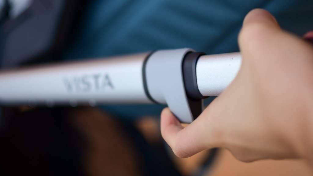 uppababy vista v2 combo - unlocking the vista v2 frame requires two hands before you can fold...