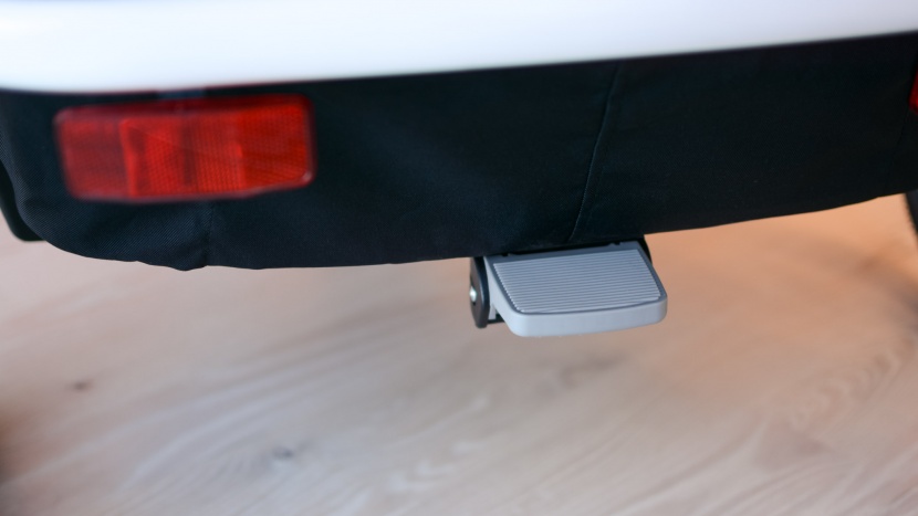 hamax outback with jogger kit - the foot brake on the hamax is easier to reach than the previous...