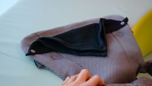 The You+Me comes with a drool bib to help keep spit-up and such off...