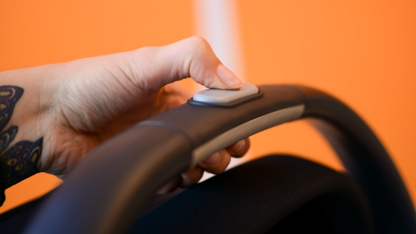 uppababy cruz v2 combo - the mesa car seat carrier release button is on the top of the handle...