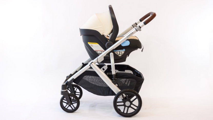 uppababy vista v2 combo - the infant car seat carrier can be placed facing forward or back on...