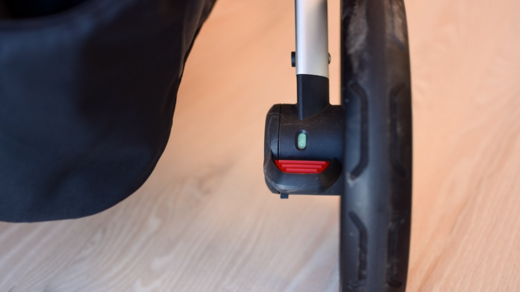 uppababy vista v2 combo - the vista&#039;s brake pedal has a color-coding to help you determine at...