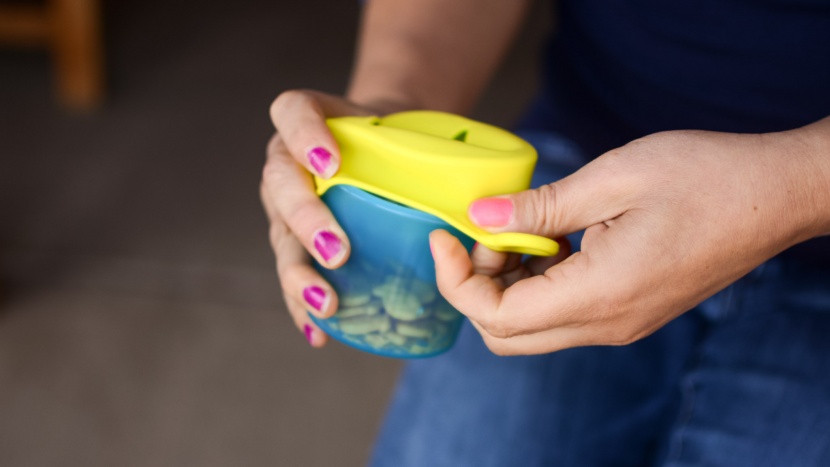 snack catcher - the cover of the boon snug easily stretches over the top of the...