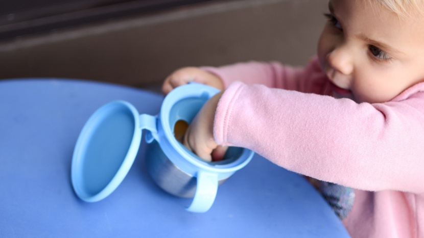 snack catcher - the soft flaps easily push aside to allow toddlers quick access to...