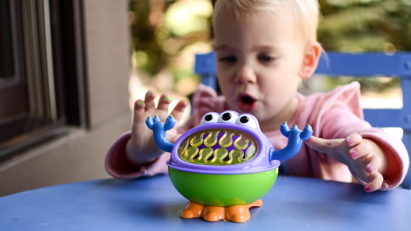 snack catcher - the arms on the nuby imonster double as handles for toddlers to grab...