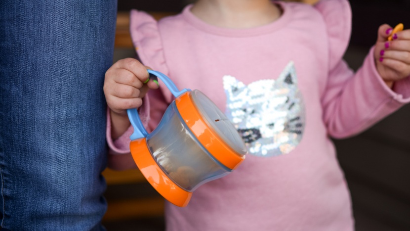 snack catcher - toddlers are not always self-aware, and may not remember to hold...