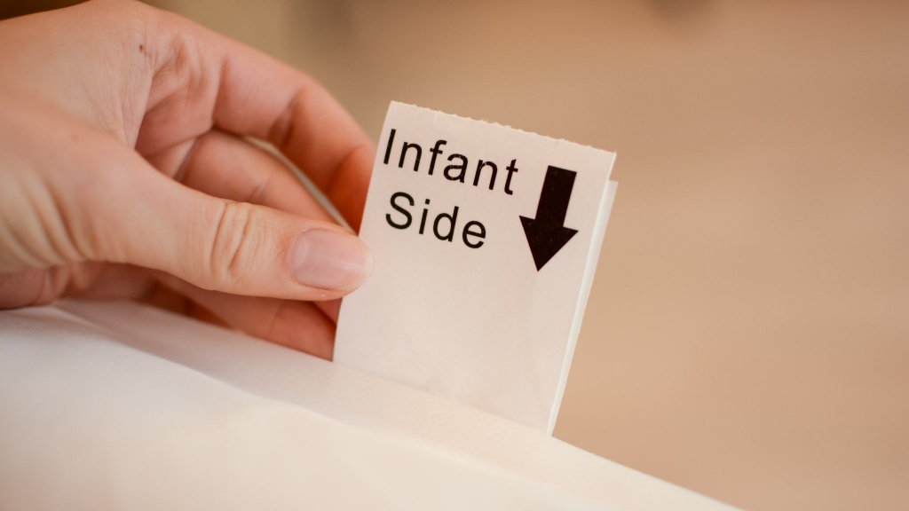 crib mattress - dual-sided mattresses typically have a firm side for infants and a...