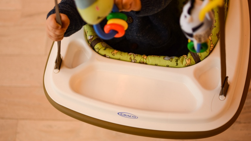 jumper - the open seat and toy tray on the graco makes it easy and versatile...