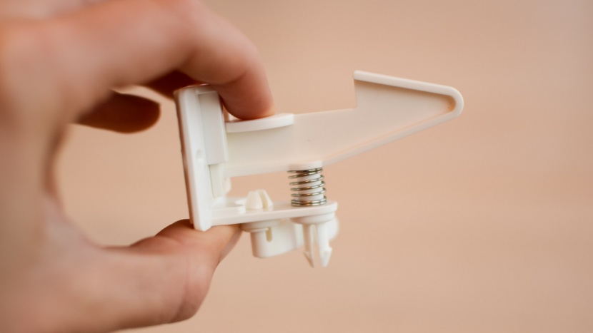 cabinet locks - the pressure latch requires the cabinet or drawer to open slightly...