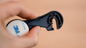 The side of the Heoath Baby Proofing Latches unlocks with a squeeze...