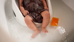 The Angelcare Bath Support is one-piece and easy to use by placing...