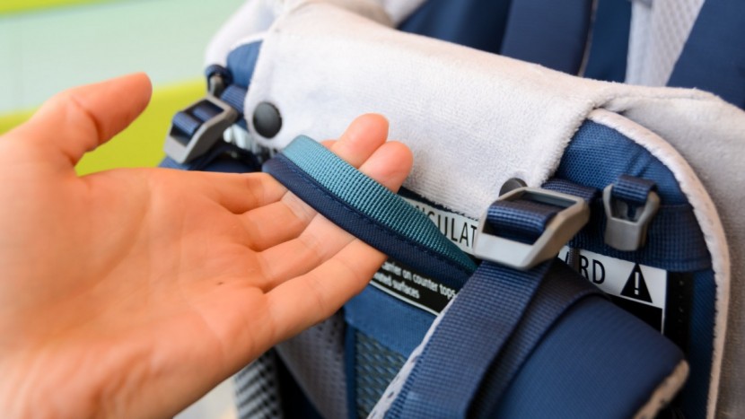the pro has a carry handle on the pack back that works well and...