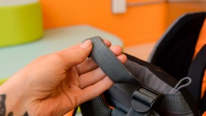 The carry handle on the LuvdBaby is on the back of the pack.