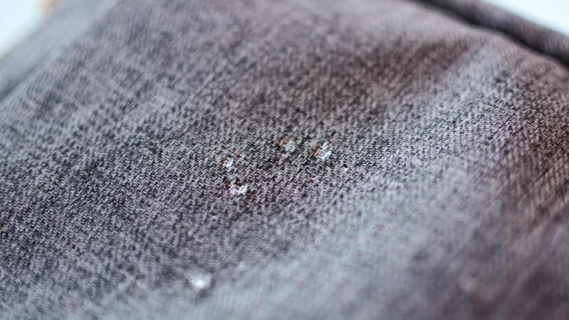 water droplets bead up on the fabric, but it does not take them long...