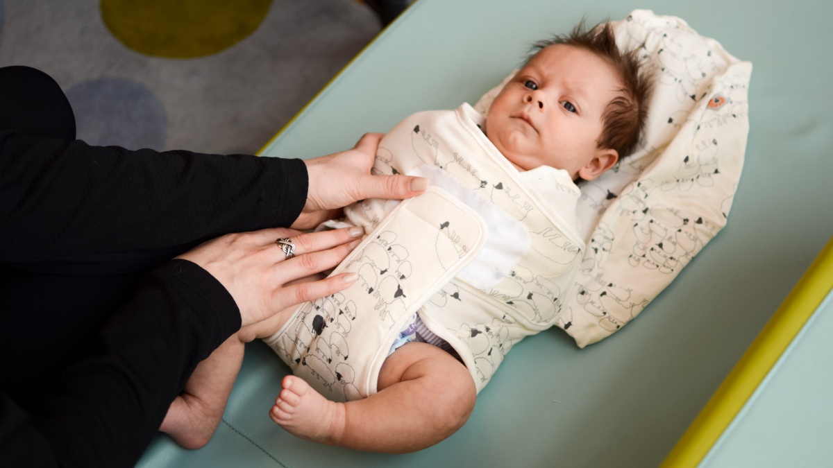 Ergobaby Swaddler Review (The Ergobaby Swaddler is a favorite for proper hip placement.)