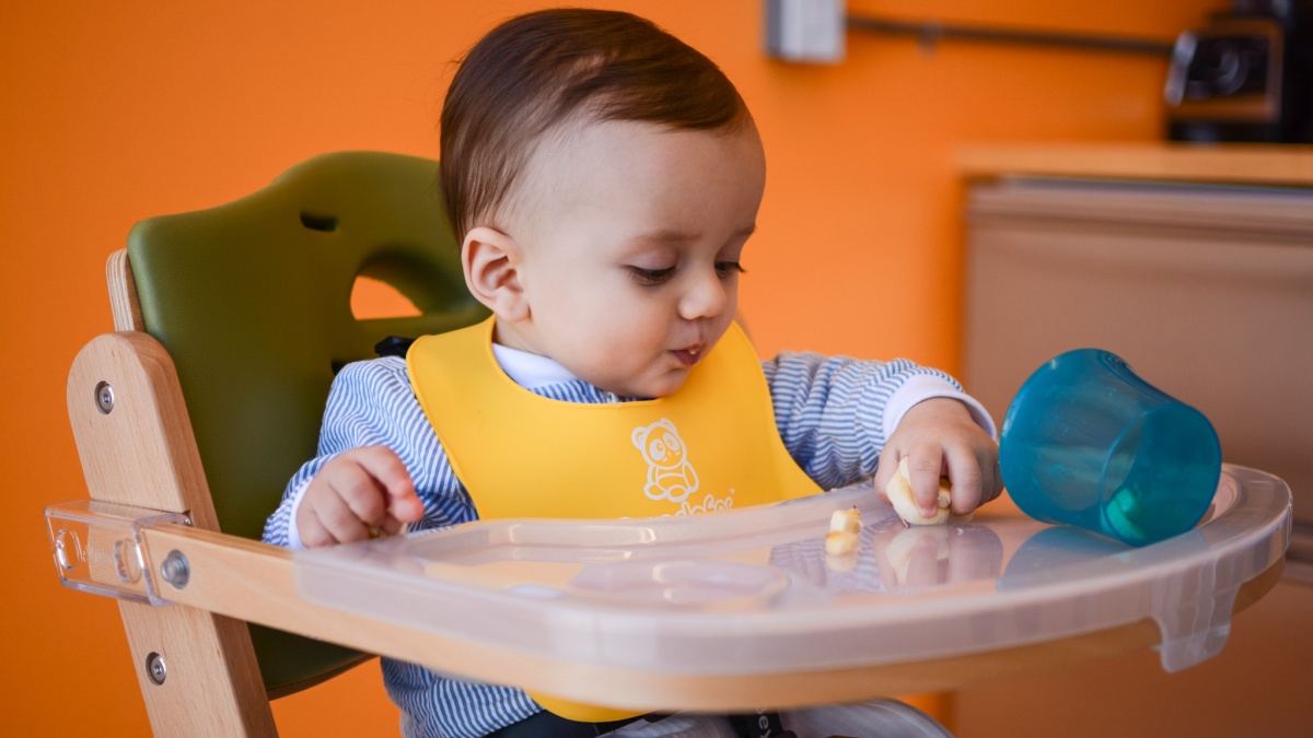 Abiie Beyond Wooden High Chair Review (Compared to others, the Abiie Beyond is one of the easiest high chairs to use.)