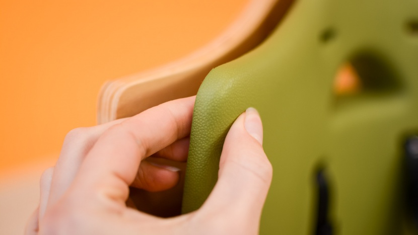 abiie beyond wooden high chair - the seat cushion on the abiie is easy to clean with a water-proof...