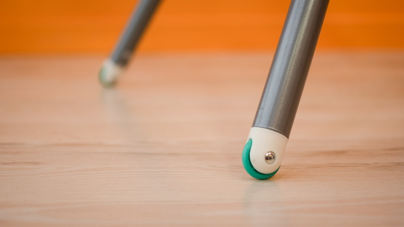 high chair - the front wheels on the infantino make it easier to move into the...