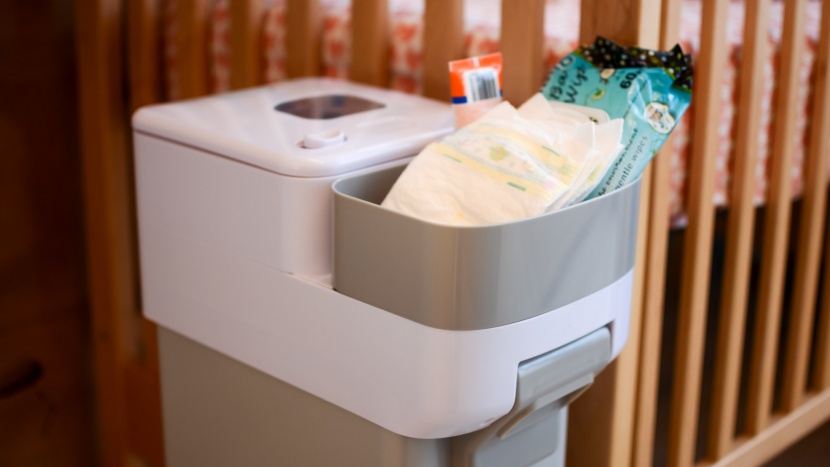 skip hop nursery style - the top part of the nursery style has both a trap door diaper...