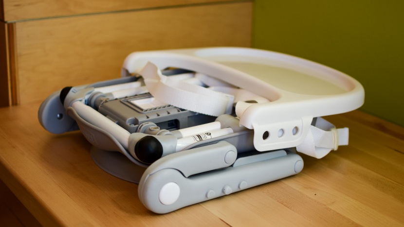 the chicco pocket booster seat folds into a compact size, but it is...