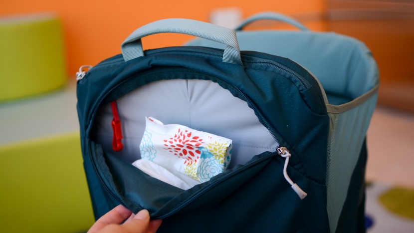 the top pocket on the lt is smaller and best utilized by flatter...