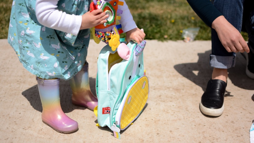 the skip hop has a large main compartment for toys, snacks, and...