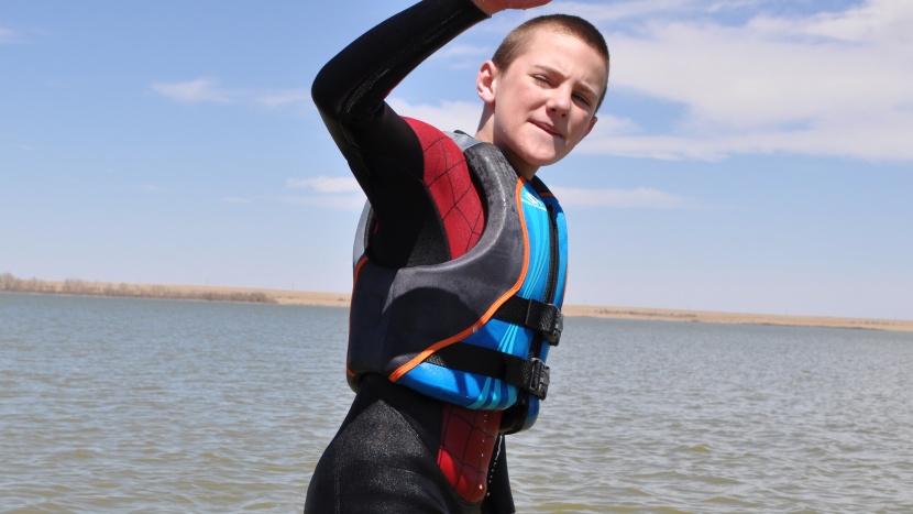 kids pfd - this stearns is stiff and harder to fit as it lacks adjustable...