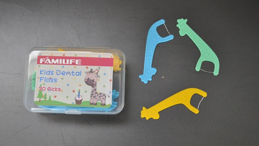 kids flossers - the plastic travel container on the familife flossers is handy and...