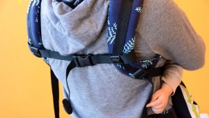 This photo of the Tula Explore looks closer at the sternum strap and...