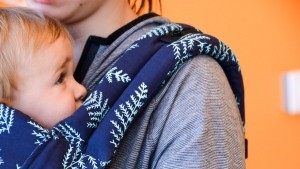 The Explore design puts baby's mouth right near padded shoulder...