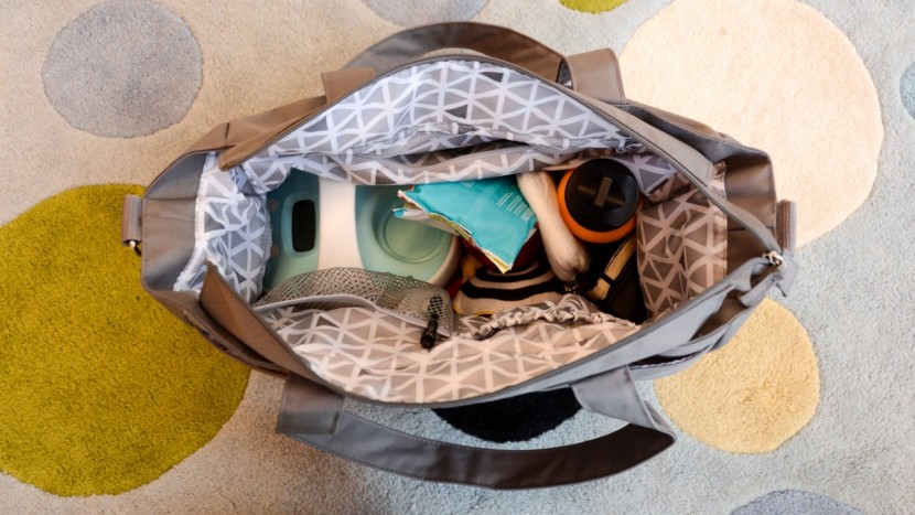 the interior of the carryall has a few pockets to help you stay...