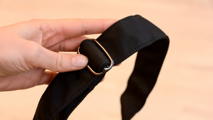 the shoulder strap on the medela is straight forward with no...