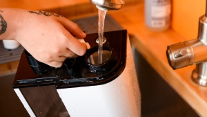 The TaoTrionics has a handle on the bottom of the tank that also...