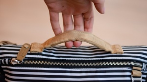 Multiple carry options add to the convenience of the Pronto Changing...