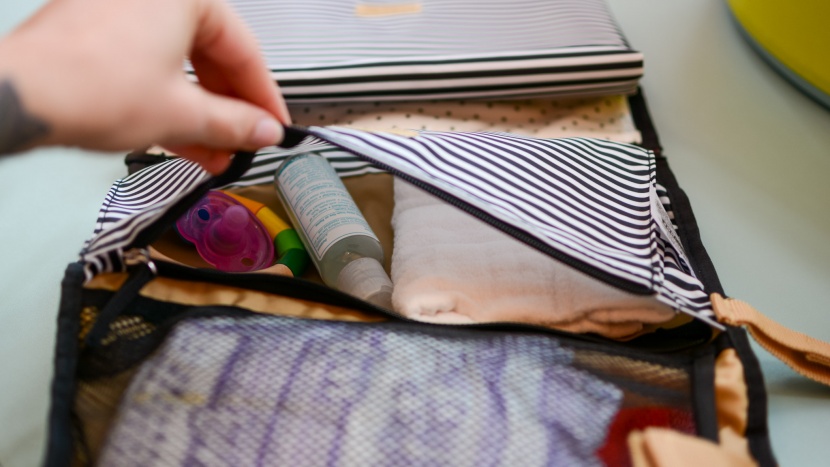 the inner zippered pocket is perfect for small items such as diaper...