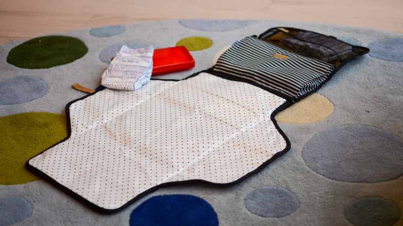 skip hop pronto - with roomy pockets and an extra-large changing pad, the pronto packs...