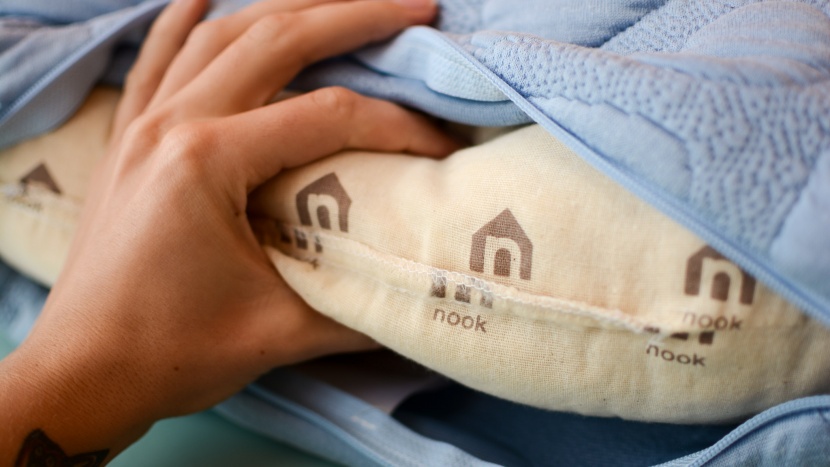 nursing pillow - the nook niche uses 100% organic kapok for its core filling.