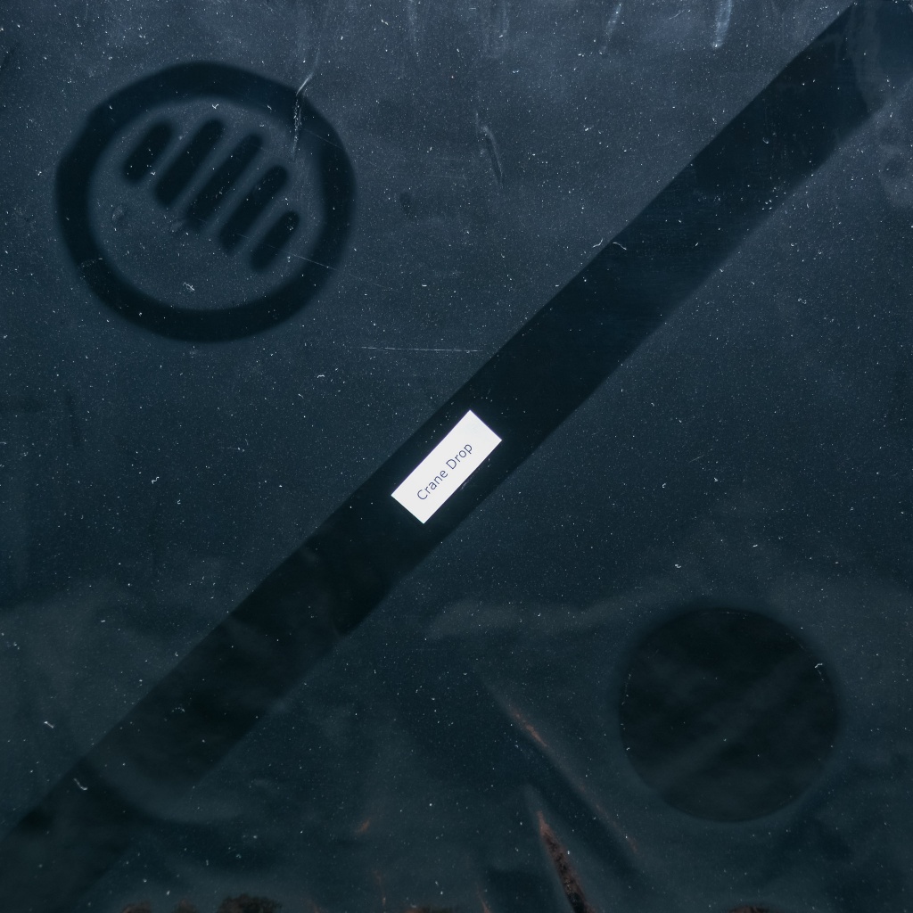 crane drop - this photo shows the dust created by the drop during a full run...