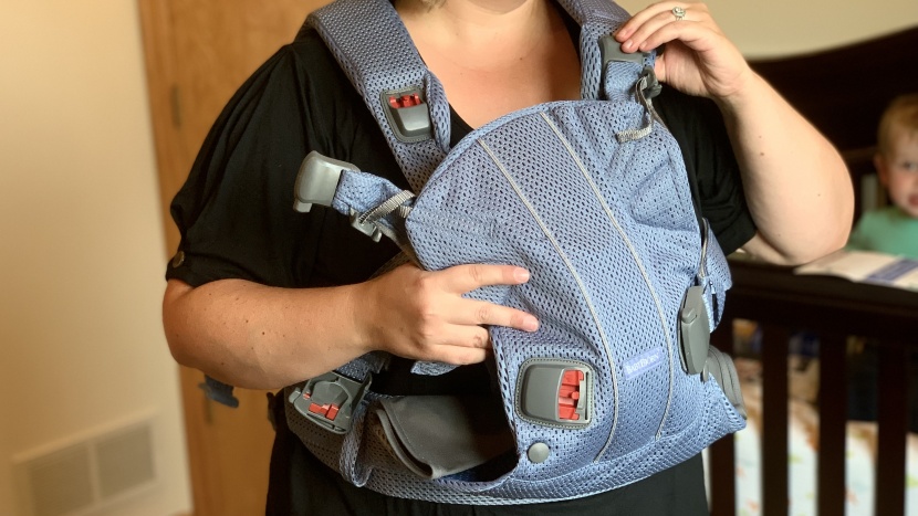 babybjorn one air - the babybjorn one air slips on and off over the wearer&#039;s head due to...