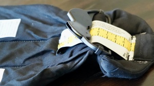 The Mini has a tape measure-like adjustment to help set the child...