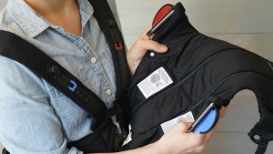The BabyBjorn Mini has color-coded slots that make the design easier...