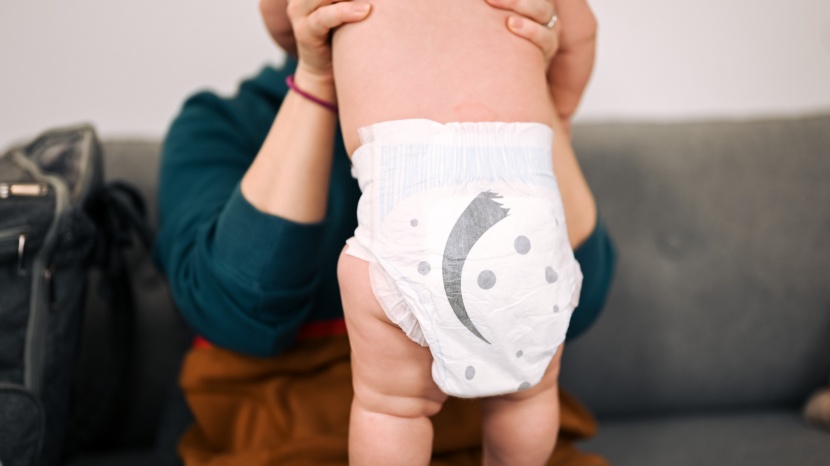 cuties complete care - the top elastic on the cuties diaper seems to do its job to keep...