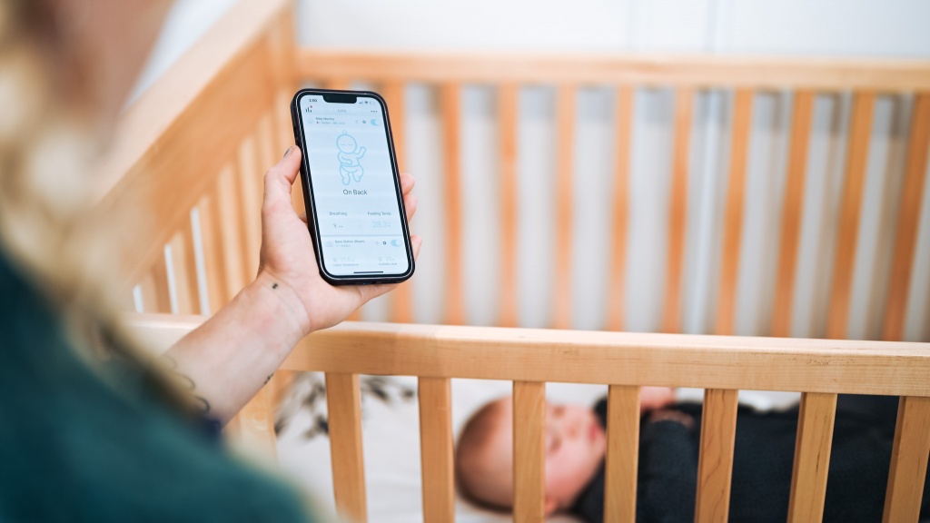sense-u baby v3 - the app for the sense-u shows the baby's position with an...