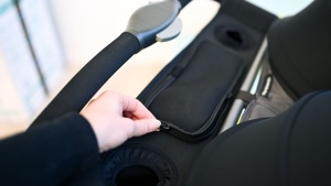 The parent console on the Joovy has a center zippered pocket and...