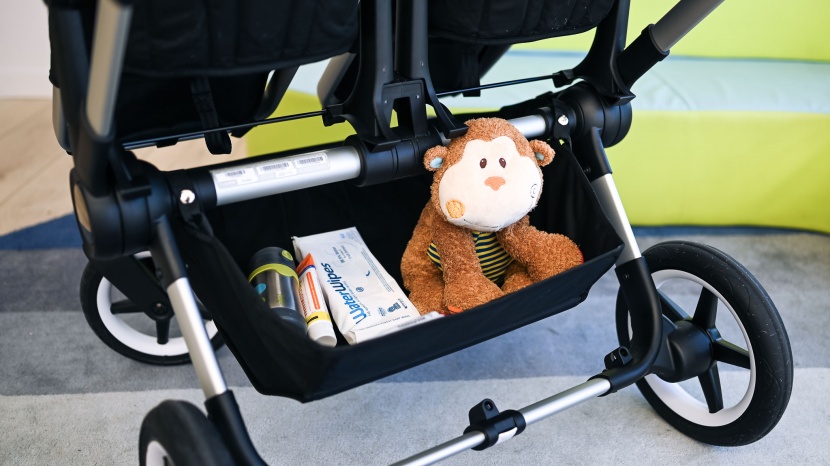 bugaboo donkey5 - the storage bin is a hanging bag that makes putting larger items...