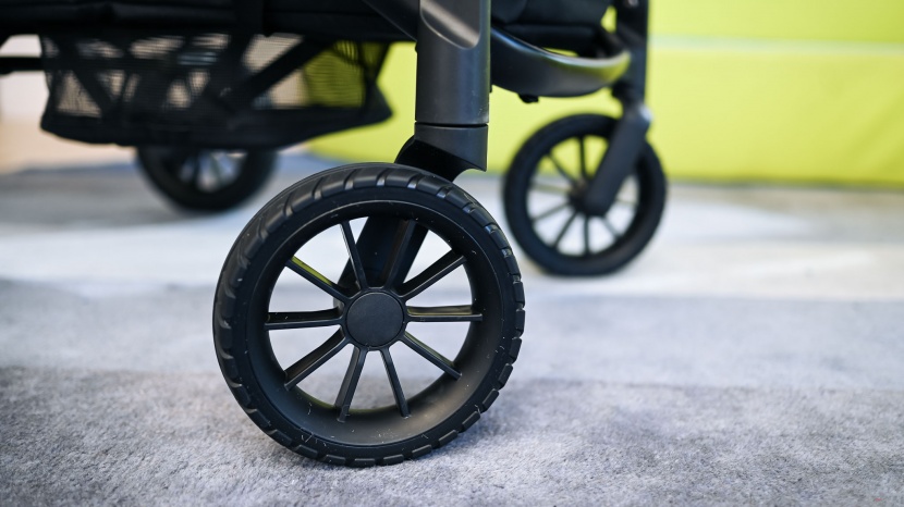 evenflo pivot xplore wagon - the wheels on the xplore are hard plastic, and the front wheels...
