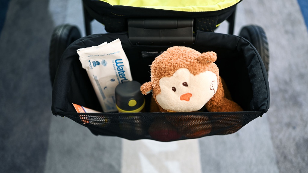 evenflo pivot xplore wagon - we were able to fit our large diaper bag in the xplore storage bin...
