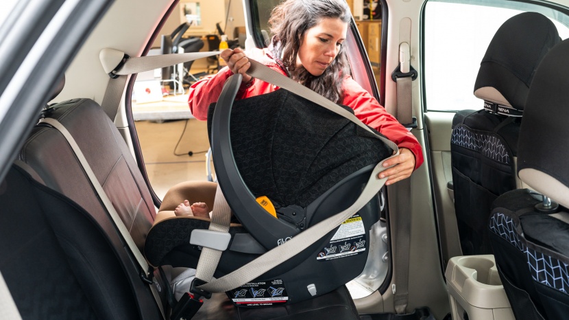 chicco fit2 - our petite tester didn&#039;t have too much trouble wrapping the vehicle...